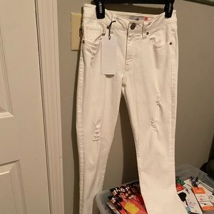 Cabi white jeans in  a high slim fit